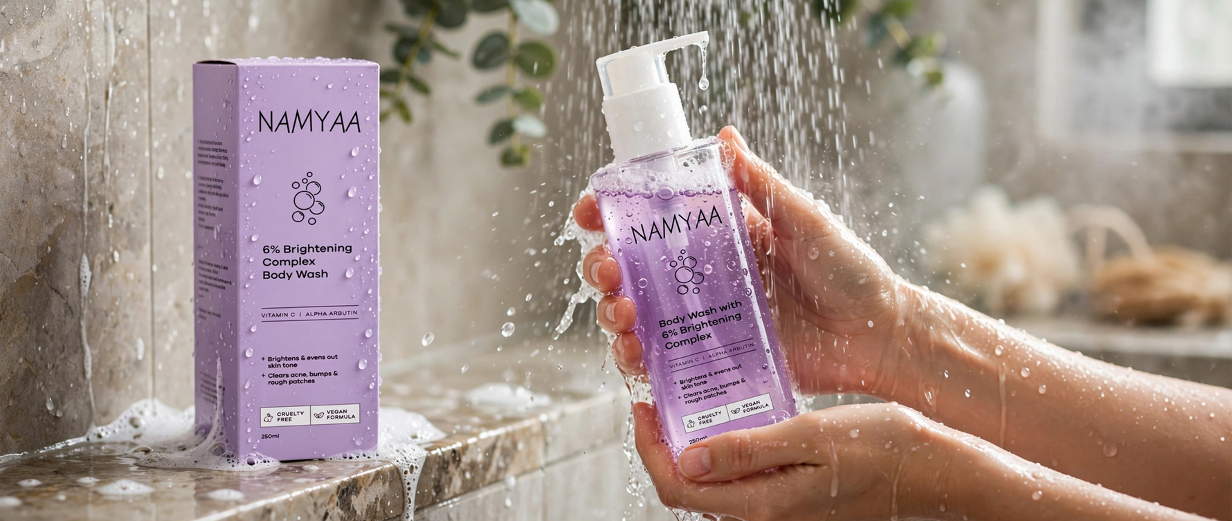 Woman holding purple Namyaa Brightening Complex Body Wash bottle with Vitamin C and Alpha Arbutin under water spray