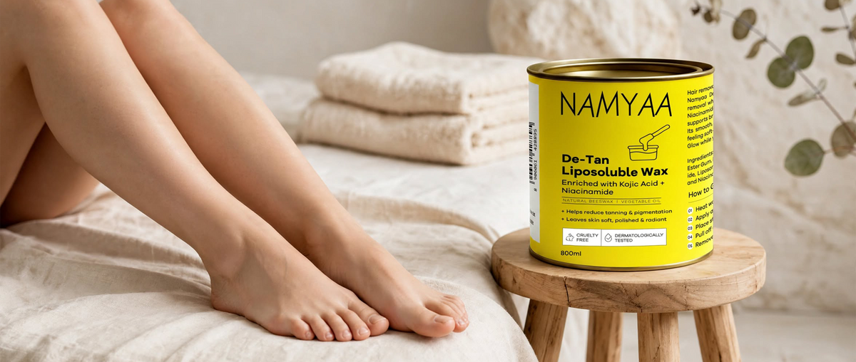Namyaa De-Tan Liposoluble Wax tin enriched with Kojic Acid and Niacinamide for smooth, radiant skin.