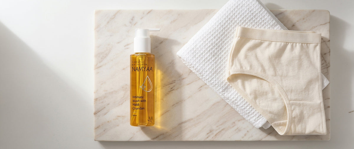 intimate hygiene after workout — pH-balanced intimate wash, clean towel, and cotton underwear for post-exercise routine